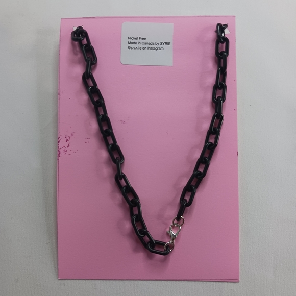 Plastic Black Link Necklace with Silver Ghost Pendant. - Picture 2 of 2